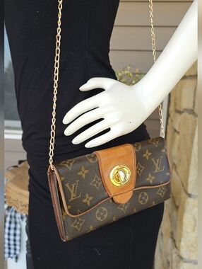 Louis Vuitton Monogram Canvas Boetie Wallet. Styled With Unbranded Chain.